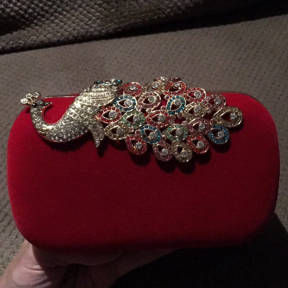 Red peacock jeweled clutch